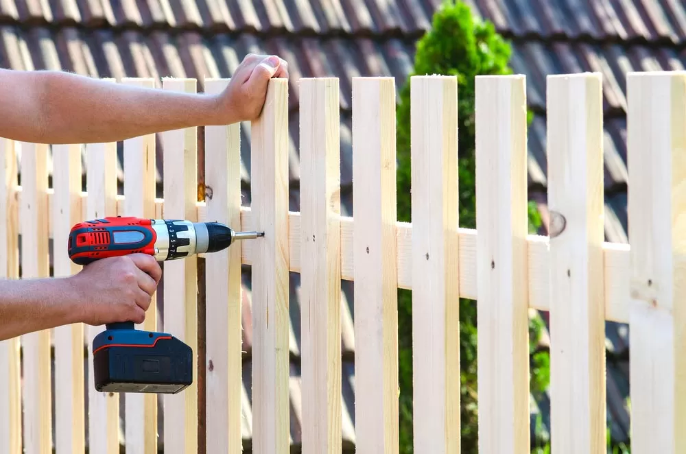 fence being repaired